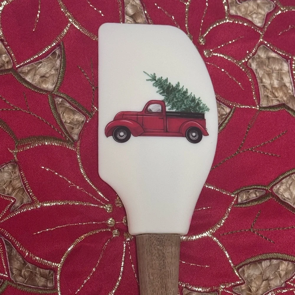 White Spatula with Red Truck delivering Christmas Tree with Dark Wooden Handle